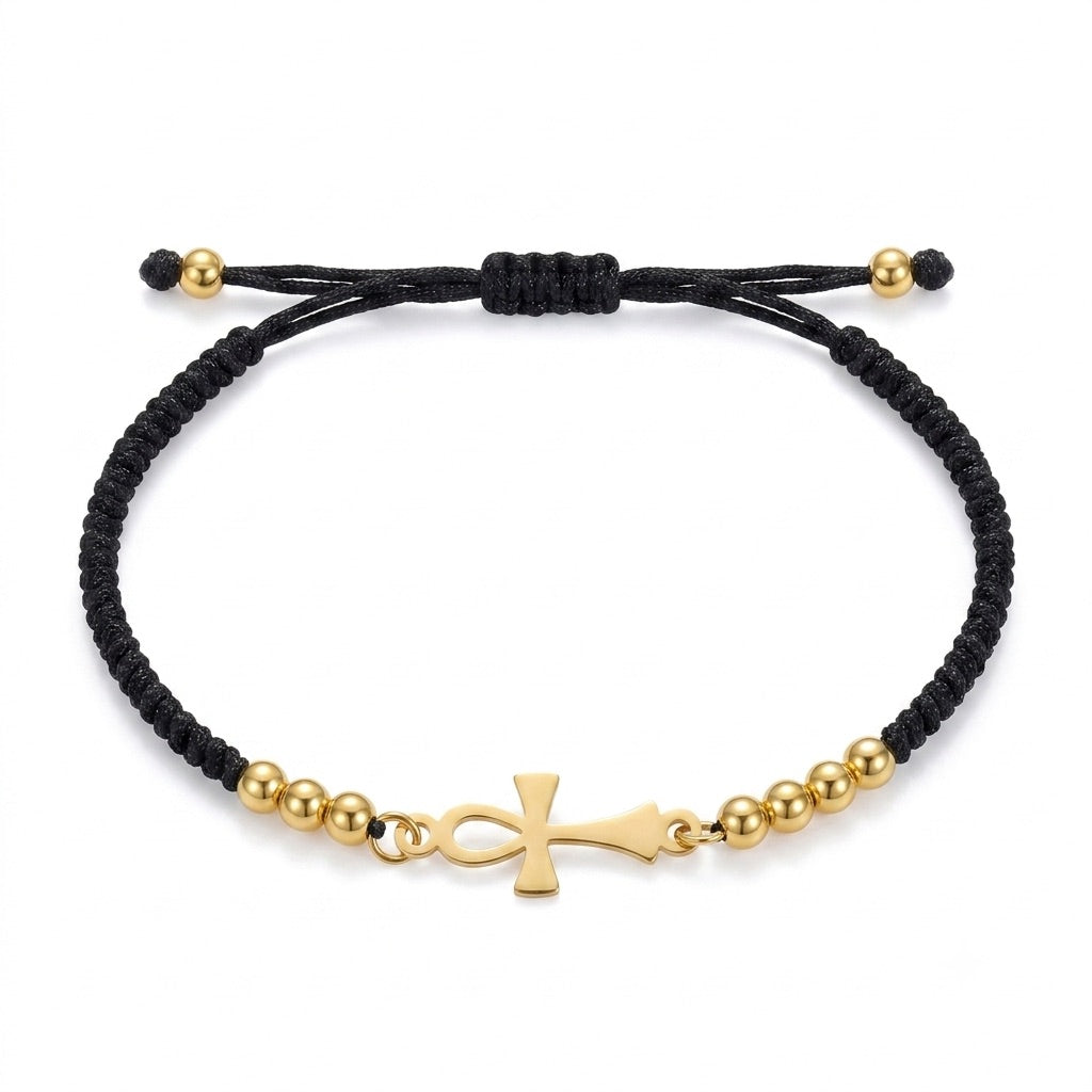 Bracelet Croix de Vie Ankh or cordon noir sur fond blanc