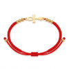 Bracelet Croix de Vie Ankh cordon rouge or sur fond blanc